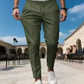 Detailed view of olive green slim fit men's business trousers with drawstring waist. - S / Bottoms / Army Green