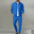 Vue détaillée du tricot gaufré bleu sur l'ensemble de sport cintré pour homme - S / Haut Et Bas / Bleu