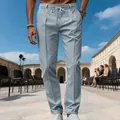 Detail view of men's slim-fit business casual trousers in light grey with elastic waist. - S / Bottoms / Light Blue
