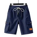 Dettaglio di pantaloncini cargo in velluto a coste blu scuro con coulisse in vita. - Taglia S / Pantaloni e gonne / Blu Notte