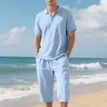 Detail of light blue men's linen beach set featuring a Polo shirt and capri pants - Light Blue