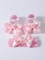 Detailed view of pink satin bows and rose accents on newborn princess shoes and headband - Size 11 (Inner Length 10.5cm) / Pink And Headband