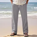 Detailed view of gray linen straight-leg casual trousers for men in a beach setting. - S / Bottom (CFT-7) / Gray