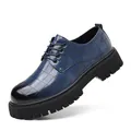 Herren-Anzugschuh mit blauem Karomuster, dicker schwarzer Profilsohle und Schnürung - 38 / Blau