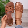 Detaillierte Ansicht brauner geflochtener flacher Sandalen für Damen im Ethno-Stil - 36 / Braun