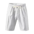 Detailed view of white vertical striped men's beach shorts with drawstring waist. - S / Bottoms / White