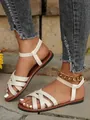 Stylish white flat sandals featuring cross straps and elastic ankle band for beach summer - Off White