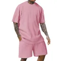 Nahaufnahme des rosa strukturierten Strickstoffs an Herren Sport Shirt und Shorts - Rosa