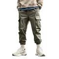 Detailed view of olive green multi-pocket outdoor cargo pants for men with jogger cuffs - S / Bottoms / Army Green