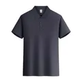 Detail shot showing the front view of a dark grey men's short-sleeved Polo shirt - M / Tops / Dark Gray