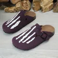 Purple suede clogs featuring white skeleton hand embroidery and an adjustable strap buckle - 35 / Purple