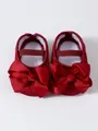 Detailansicht der roten Baby-Mädchen-Lauflernschuhe mit weicher Sohle und großen Schleifen - Weinrot (25301)