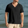 Macro view of men's black slub linen-look fabric on a short sleeve Henley T-shirt - S / Tops / Black