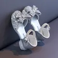 Elegant silver girls' princess sandals featuring sparkling rhinestones and a large sequined bow - Size 26 Inner Length 15.8cm / Silver