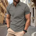 Detailopname van grijs getextureerd heren poloshirt met ademende sportieve stof. - S / Tops / Grijs