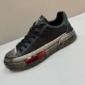 Baskets décontractées tendance en cuir noir pour hommes avec semelle métallique à étages. - 38 / Noir