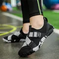 Scarpe da scoglio nere traspiranti con cinturini grigi per allenamento e sport acquatici - 25 / Nero