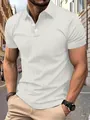 Close-up of men's white knit polo shirt with small grid pattern and turn-down collar. - S / Tops / White