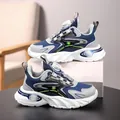 Blue and grey boys' sporty running shoes featuring a convenient rotating buckle system - Dark Blue