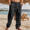 Close-up detail of men's black pinstripe linen casual straight trousers on beach - S / Bottoms / Black