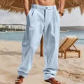 Detailed view of light blue striped linen casual pants for men in a beach resort setting - Light Blue