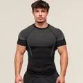 Men's professional black muscle fitness compression T-shirt with grey honeycomb texture - M / Tops / Black and White