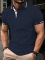 Detailed view of navy blue men's polo shirt with contrast white piping and buttons - Navy Blue
