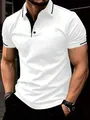 Detail of a men's white athletic polo shirt featuring black contrast trim on collar - S / Tops / White