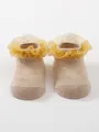 Sweet beige baby boat socks featuring a vibrant yellow tulle ruffle lace trim detail - S (0-6 Months) / Khaki