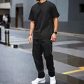 Detailed view of men's black heavy jacquard short sleeve T-shirt and pants outdoor outfit - S / Top And Bottom / Black