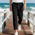 Men's loose black linen trousers walking on a beach pier, casual summer beach style - S / Bottoms / Black