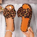 Elegantes sandalias de plataforma para mujer con estampado de leopardo y un lazo - 36 / Marrón Oscuro