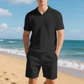 Detailed view of men's black waffle knit polo set with textured fabric on the beach - S / Top And Bottom / Black
