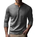 Close-up of a men's grey long sleeve Henley shirt with detailed button neckline - Dark Gray