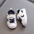 Comfortable white toddler walking shoes with navy blue velcro straps and moon patches - Inner Length 12.5cm / Size 16 / Dark Blue