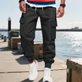 Men's heavy-weight black cargo joggers with functional side pockets and elastic cuffs. - S / Bottoms / Black