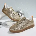Glittery gold women's low-top sneakers with rubber soles and white lining - 35 / Gold