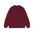 Detail view of burgundy cotton long-sleeve T-shirt featuring a crewneck and ribbed cuffs - Burgundy
