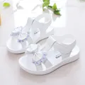 White girl's summer sandals with sparkling rhinestone bow and soft comfort sole. - 25 / White