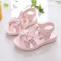 Charming pink sandals for girls featuring a large rhinestone bow and soft flexible sole - 25 / Pink