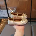 Adorable champagne gold girl's ballet flat shoes featuring a sweet bow decoration detail - Size 23 Inner Length 14cm / Gold