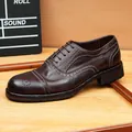 Classic vintage washed horsehide Oxford shoes with intricate brogue carving in dark brown - 38 / Coffee