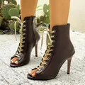 Close-up of sexy brown lace-up jazz dance boots with peep toe and stiletto heels - 35 / Brown