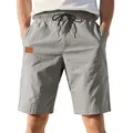 Close-up of men's grey twill casual shorts with drawstring waist and leather patch detail - S / Bottoms / Light Gray
