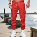 Red heavyweight men's cargo joggers with drawstring and side pockets in dock setting - S / Bottoms / Red