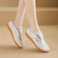 White GAT-style women's sneakers featuring metallic silver accents and gum soles. - 35 / GAT Style (1088) / White