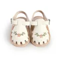 Front view of white infant walking sandals with embroidered floral pattern - 11cm / White