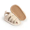 Detail view of beige baby pre-walker sandals with braided straps and anti-slip sole - Insole Length 11cm / Apricot