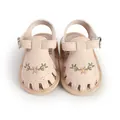 Close-up of beige baby girl sandals with floral embroidery and breathable cut-outs. - 11cm / Apricot