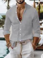 Detailed shot of men's grey cotton linen shirt with stand collar in resort setting - S / Tops / Gray